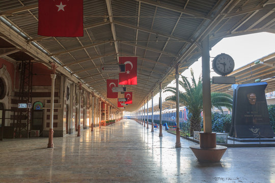 Historical Sirkeci train station with turkish flags