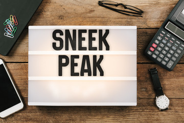Sneek peak in vintage style light box on office deskt op