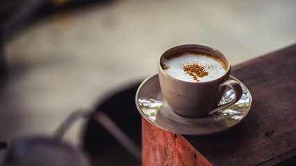 White cup of hot cappuccino coffee