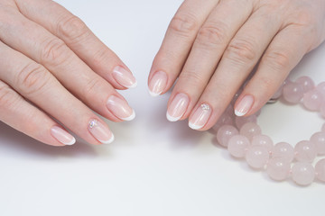Beautiful woman's hands. Natural nails and manicure. Spa procedure.