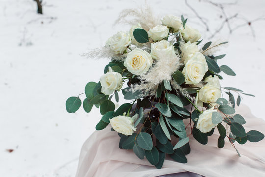 Beautiful stylish white winter rose bouquet close-up