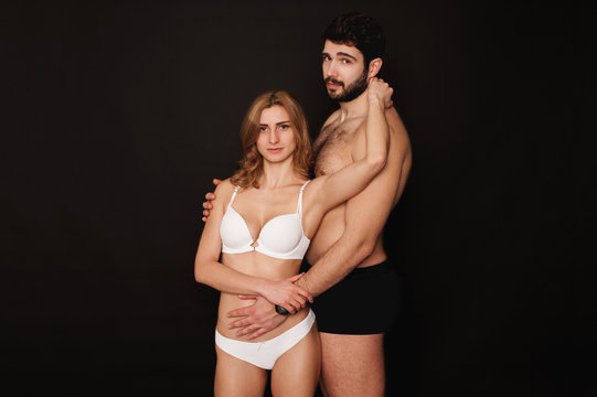 Photo of a young hot couple in lingerie