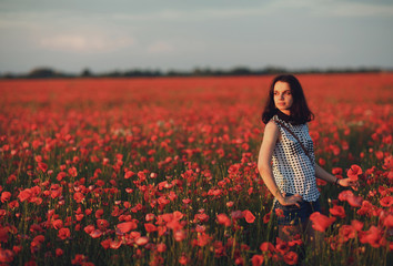 original photo beautiful girl midst of red poppies