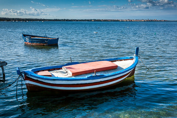 Naklejka na ściany i meble Marsala, Trapani, Sicily, Italy - boat on the sea