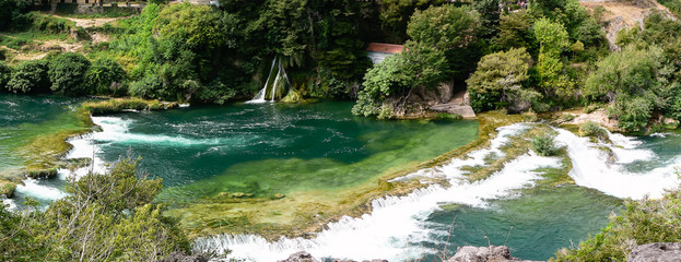 Naklejka na ściany i meble Mountain stream in national park Plitvice Hrvatia
