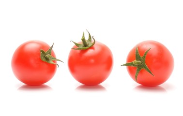 red fresh ripe tomatoes isolated on white background