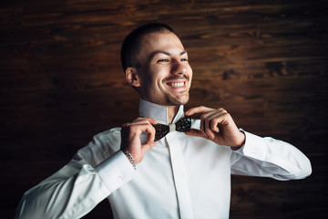 The fiance wears a butterfly