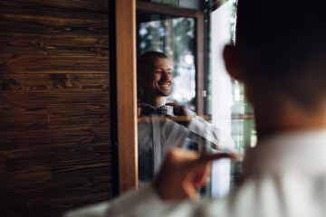 The fiance wears a butterfly