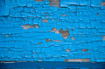 Scratched Paint at Blue Wood Wall