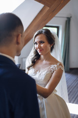Naklejka premium The bride looking at her groom