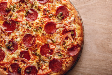 Fresh baked pepperoni pizza, shallow depth of field