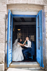 The charming brides sitting in the restaurant