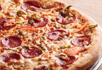 Fresh baked pepperoni pizza, shallow depth of field
