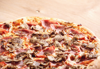 Italian pizza with cheese and olives macro. Pizza with mozzarella, olives and basil top view with copy space