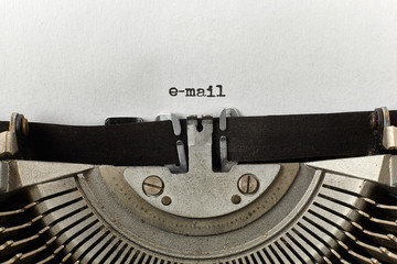 e-mail typed words on a vintage typewriter
