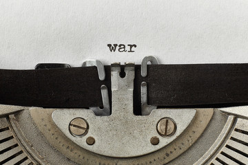 war typed words on a vintage typewriter