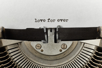 love for ever typed words on a vintage typewriter