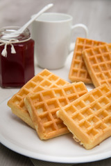 Waffles with berry jam and tea