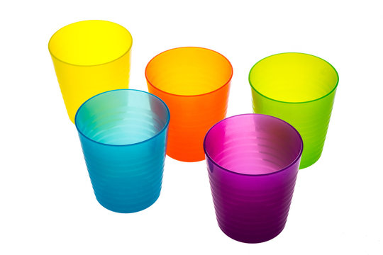 Set of plastic colorful cups isolated on white background