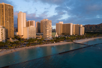 Fototapeta na wymiar Aerial drone image of Waikiki Beach at sunset