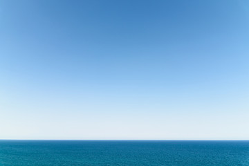 Obraz premium Calm Ocean Water And Clear Blue Sky