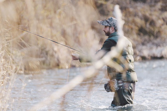 Person fishing with the rod