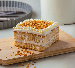 Almond cake with cream and roasted almonds