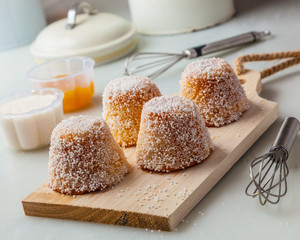 Small cakes with white aniseed sprinkles.