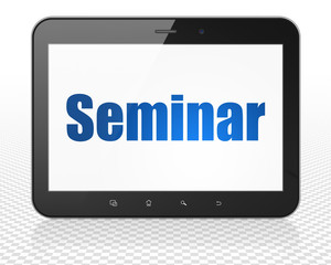 Learning concept: Tablet Pc Computer with Seminar on display