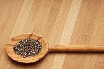 Chia seeds in a wooden spoon