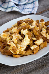Poutine quebec meal with french fries, gravy and cheese curds