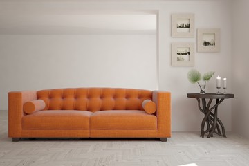 White room with orange sofa. Scandinavian interior design