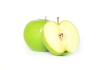 Ripe green apple and slice isolated on a white background