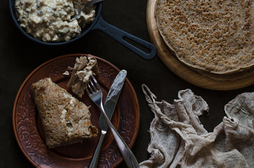 Pancakes on rye flour stuffed with julienne