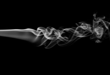 Smoke. White smoke swirls over black background. Abstract smoke on black background