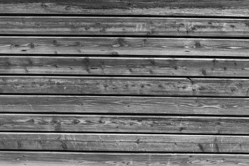 Hintergrund, horizontal ausgerichtete Holzbretter grau schwarz