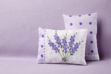 Purple cushion with lavender and polka dots