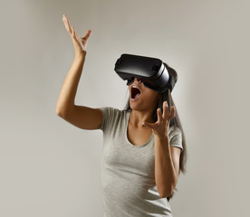 attractive happy woman excited using 3d goggles watching 360 virtual reality vision enjoying