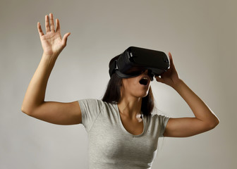 attractive happy woman excited using 3d goggles watching 360 virtual reality vision enjoying