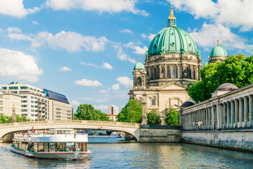 Berlin Cathedral at famous Museum Island with excursion boat river - obrazy, fototapety, plakaty