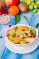 Fresh fruit salad in a bowl. Healthy dish.
