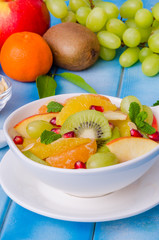 Obraz na płótnie Canvas Fresh fruit salad in a bowl. Healthy dish.
