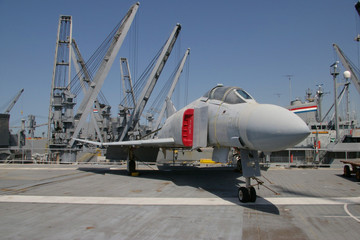 Fototapeta na wymiar ALAMEDA, USA - MARCH 23, 2010: F-4 Phantom, aircraft carrier Hornet in Alameda, USA on March 23, 2010.