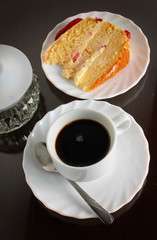 piece of strawberry cake with coffee