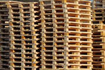 wooden euro pallets on warehouse backyard