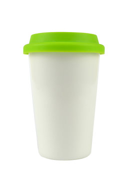 White porcelain cup for coffee or hot drinks covered with its green lid, isolated on white