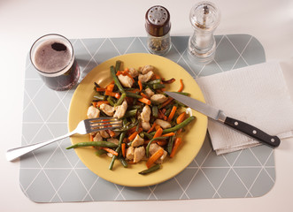 vegetables with meat on yellow plate