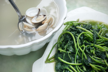 soup with mussels and spinach