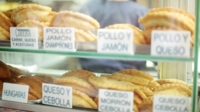 Assorted empanadas in display case