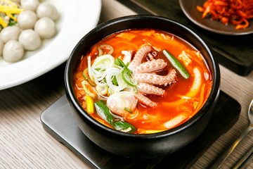 beef and small octopus rice soup. This food is Korean cuisine.